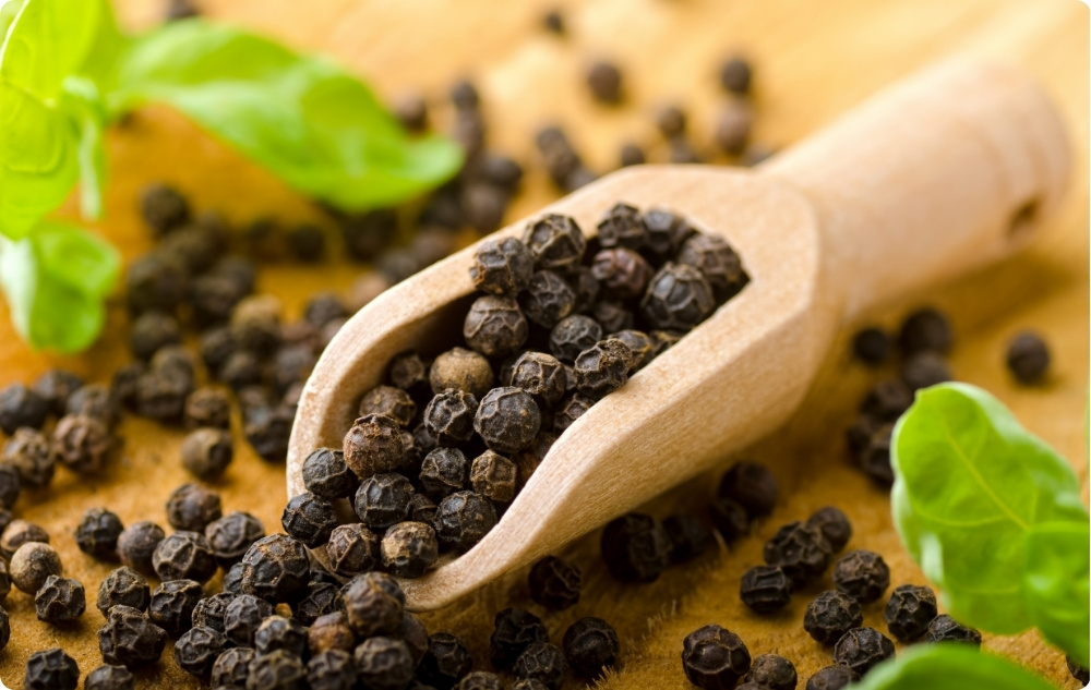 What does Black Pepper Essential oil help with?